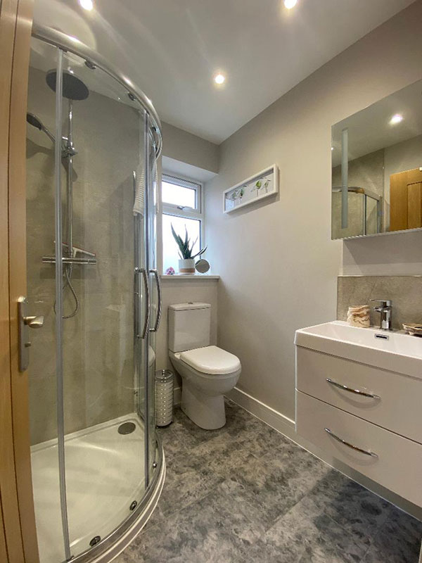 An image of the ensuite shower room included with the Mauve room